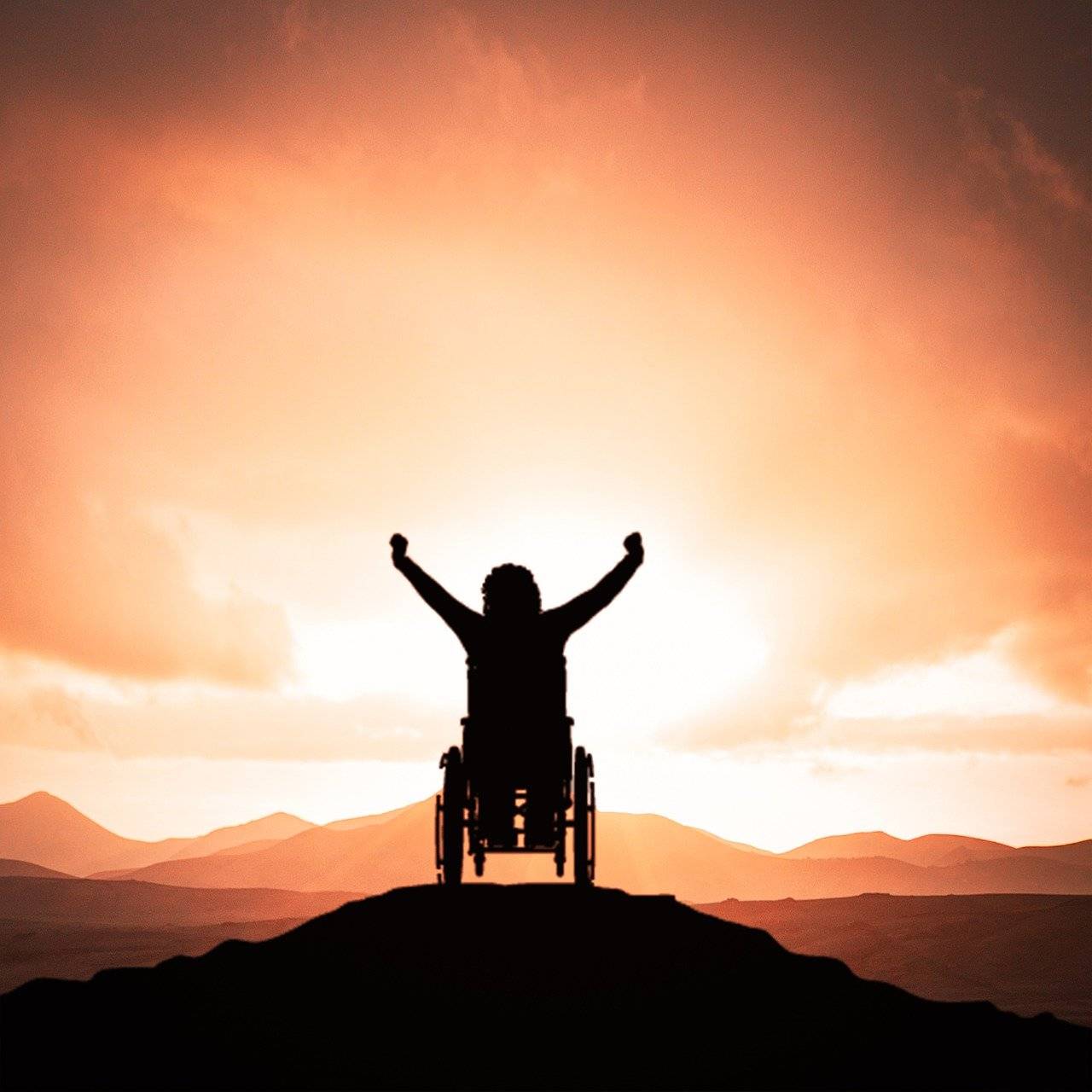 I made it to the top of the hill in my wheelchair just before sunset and the sky is and the surroundings are bathed in pink, what a wonderful world.